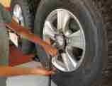 Learn to change a tyre in Darwin